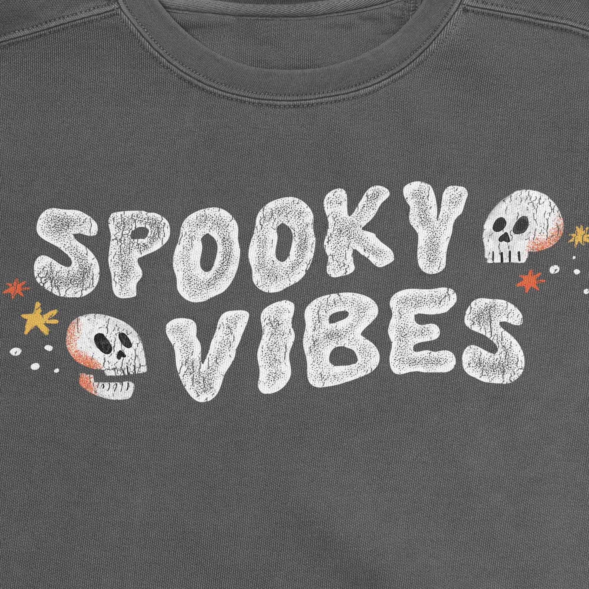 Spooky Vibes Halloween crewneck sweatshirt with Skulls on Garment Dyed Grey Crewneck Sweatshirt made by Nurtured by Nature Studio