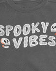 Spooky Vibes Halloween crewneck sweatshirt with Skulls on Garment Dyed Grey Crewneck Sweatshirt made by Nurtured by Nature Studio