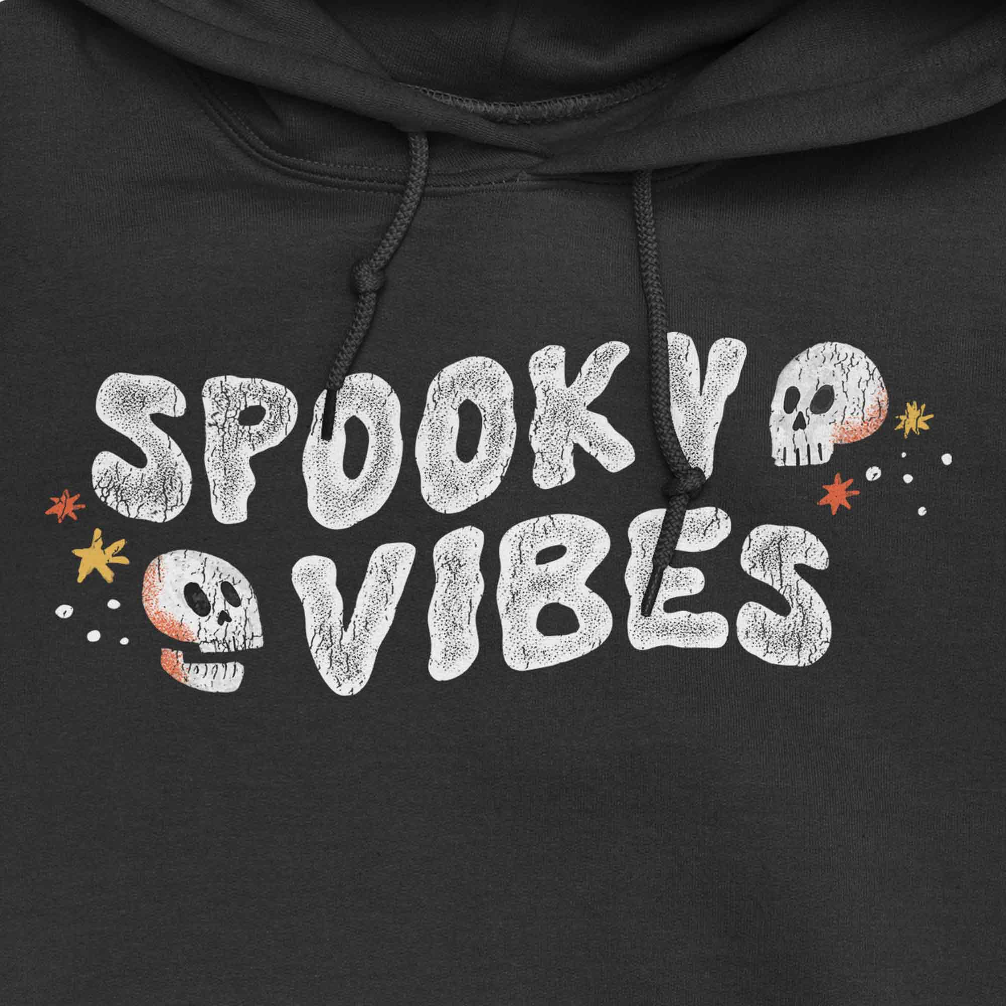 Spooky Vibes Halloween T-Shirt with Skulls on Black Hoodie by Nurtured by Nature Studio